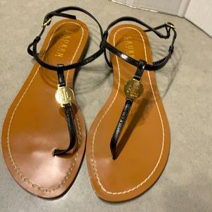 Lauren RalphLauren black sandal with gold pendant.